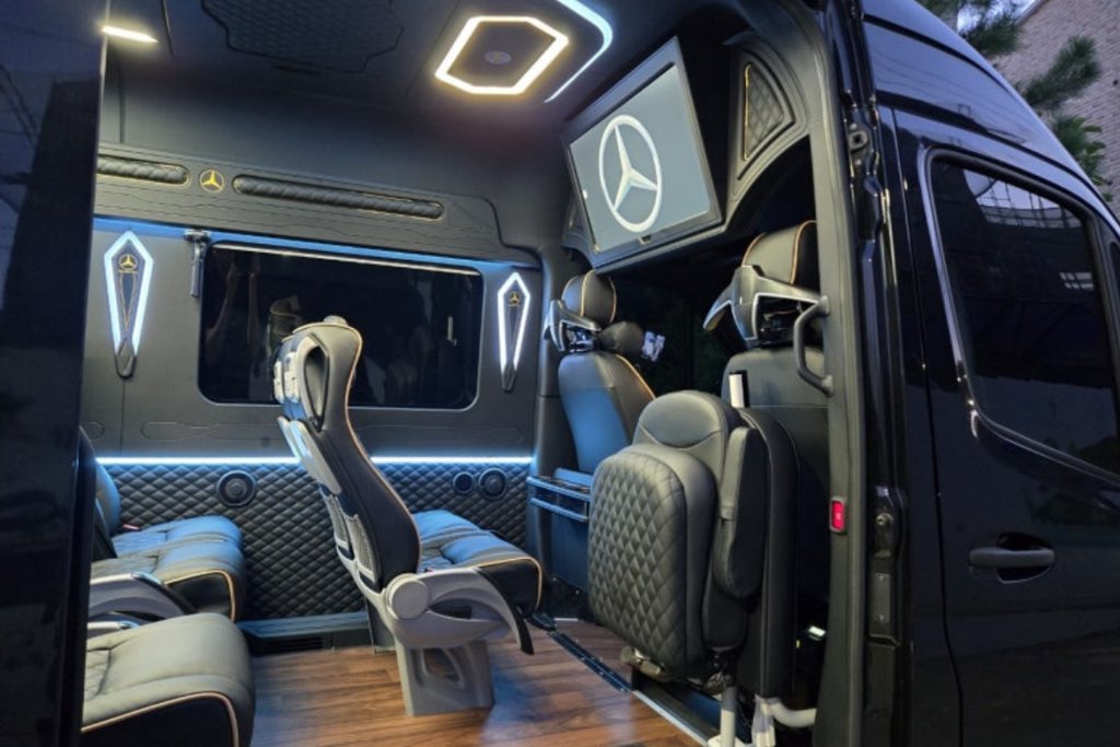 Lounge seating inside a Mercedes-Benz Sprinter van